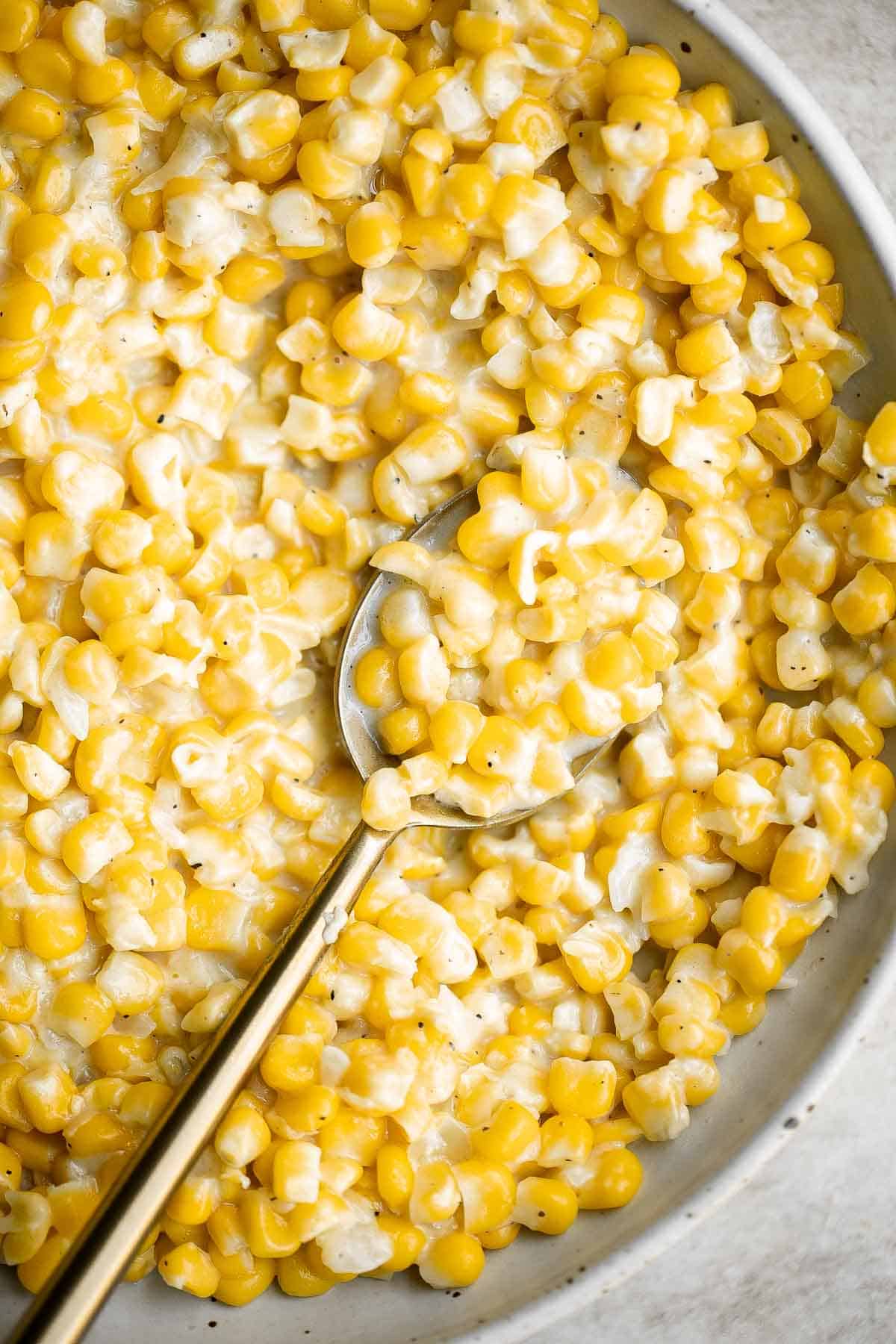Homemade Creamed Corn is creamy, delicious, and simple. It’s quick and easy to make at home and so much better than store-bought canned creamed corn. | aheadofthyme.com