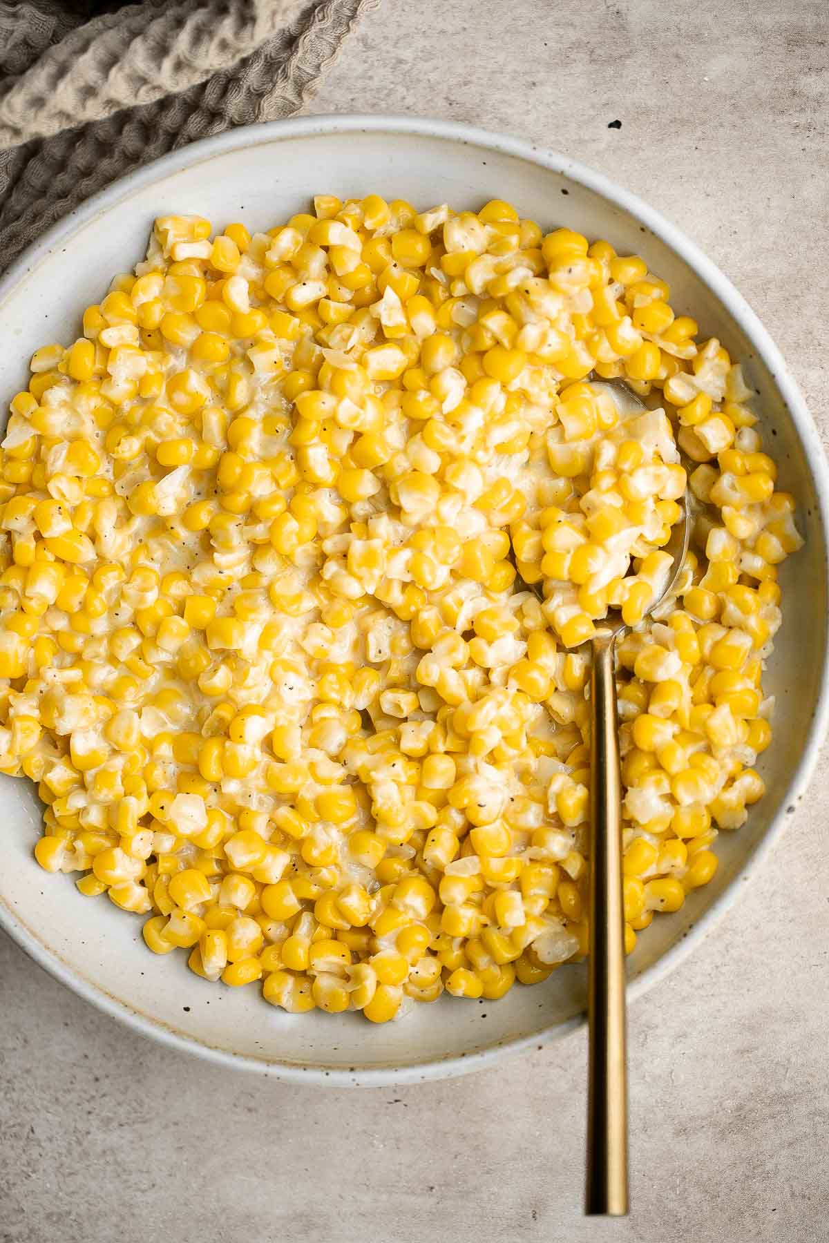 Homemade Creamed Corn is creamy, delicious, and simple. It’s quick and easy to make at home and so much better than store-bought canned creamed corn. | aheadofthyme.com