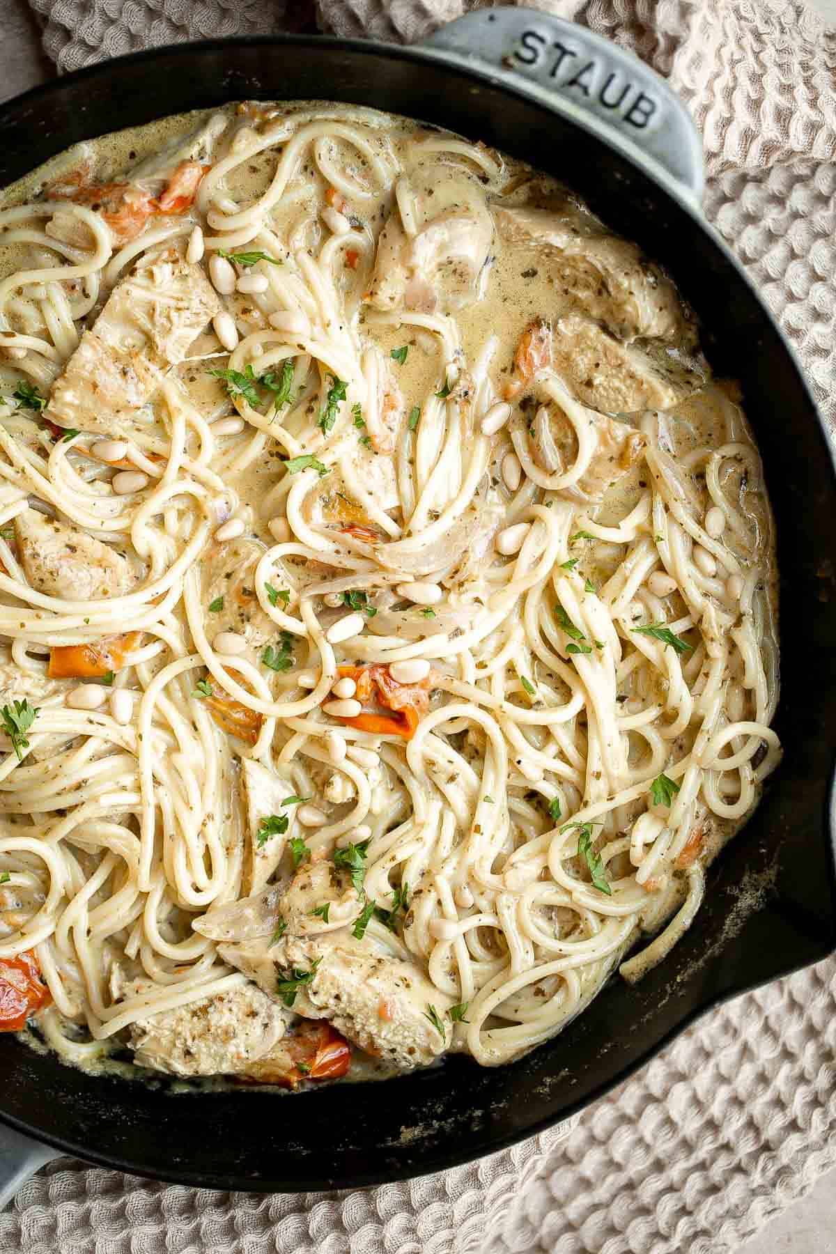 Creamy Chicken Pesto Pasta is a delicious 30 minute recipe that is packed with flavor, quick and easy to make, and will satisfy the whole family. | aheadofthyme.com