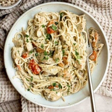 Creamy Chicken Pesto Pasta is a delicious 30 minute recipe that is packed with flavor, quick and easy to make, and will satisfy the whole family. | aheadofthyme.com