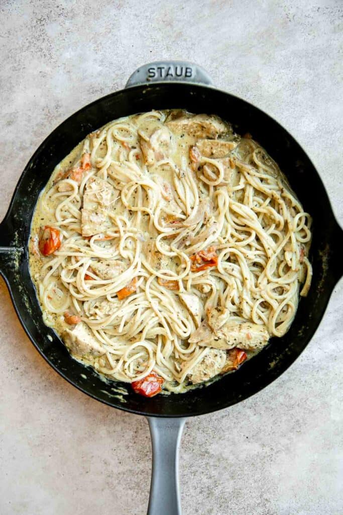 Creamy Chicken Pesto Pasta is a delicious 30 minute recipe that is packed with flavor, quick and easy to make, and will satisfy the whole family. | aheadofthyme.com