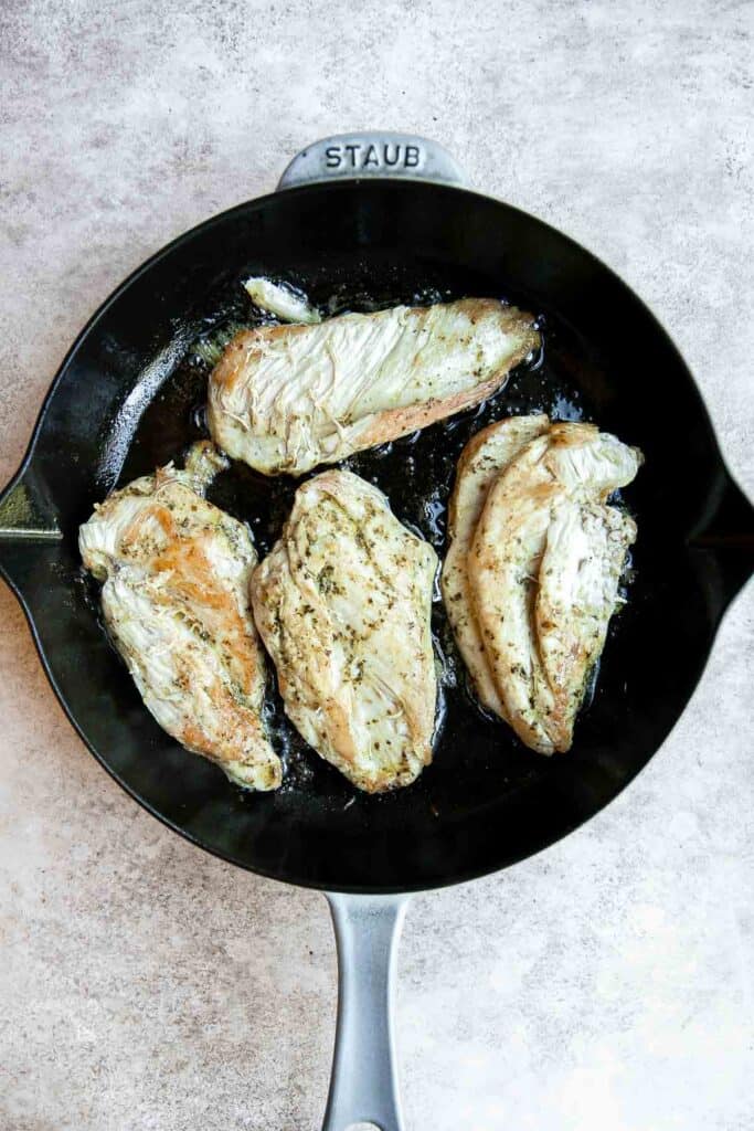 Creamy Chicken Pesto Pasta is a delicious 30 minute recipe that is packed with flavor, quick and easy to make, and will satisfy the whole family. | aheadofthyme.com