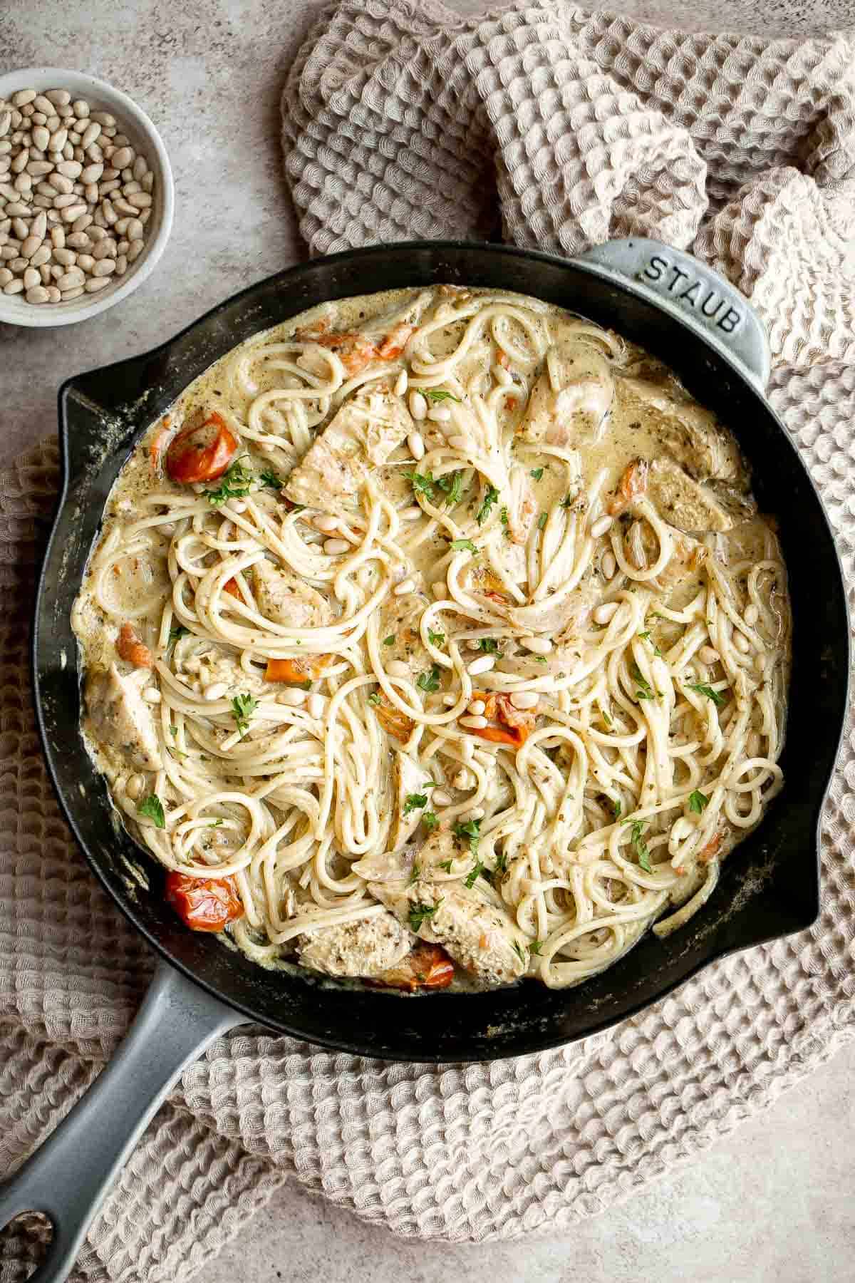 Creamy Chicken Pesto Pasta is a delicious 30 minute recipe that is packed with flavor, quick and easy to make, and will satisfy the whole family. | aheadofthyme.com