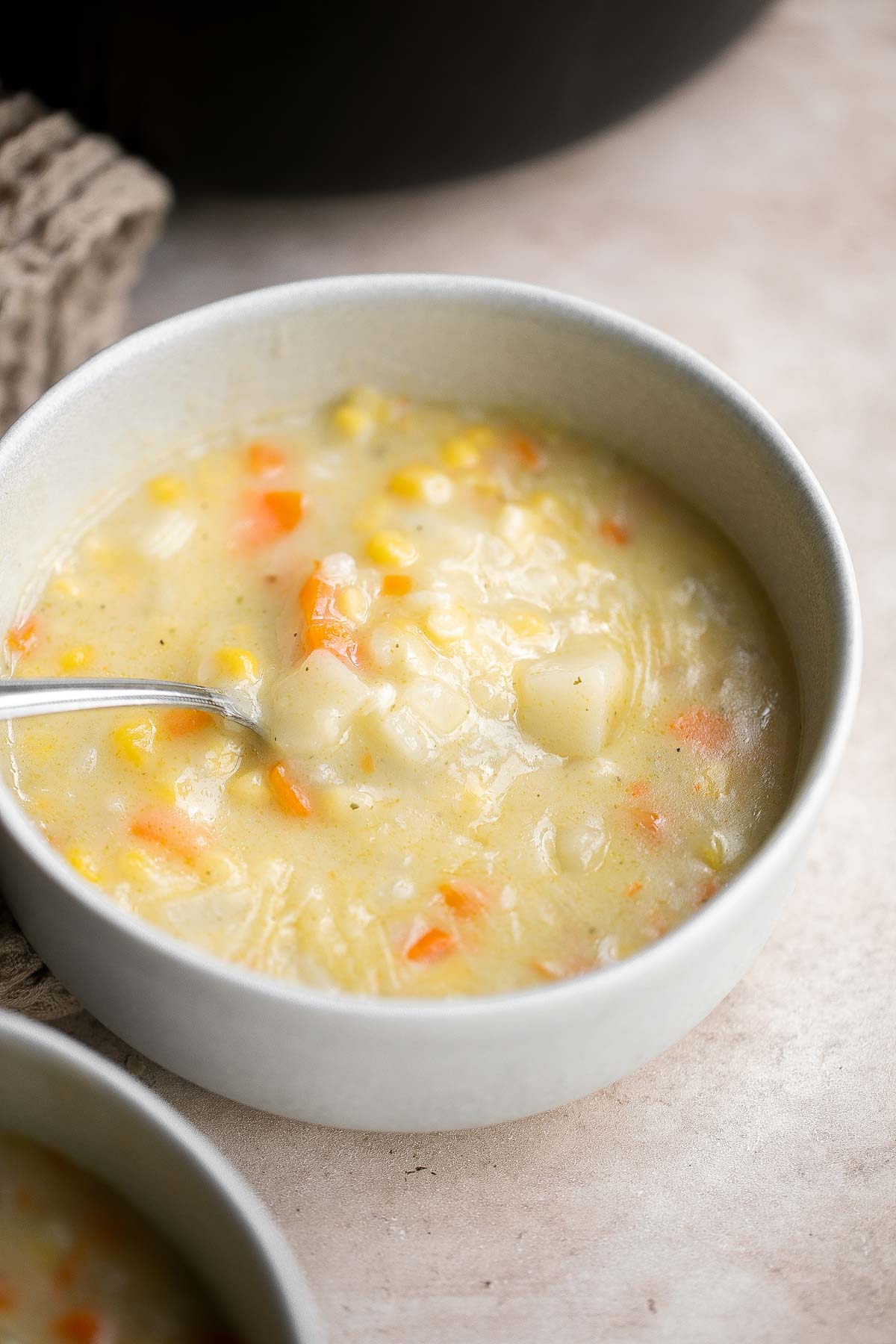 Potato Corn Chowder is rich, creamy, hearty, and delicious. Made with simple ingredients in 35 minutes, this vegetarian soup is perfect for a quick meal. | aheadofthyme.com