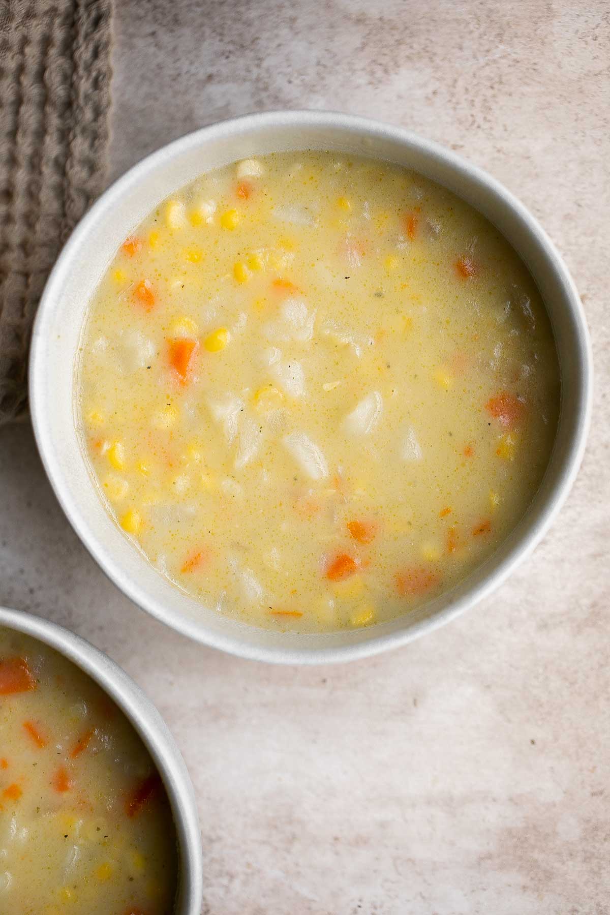 Potato Corn Chowder is rich, creamy, hearty, and delicious. Made with simple ingredients in 35 minutes, this vegetarian soup is perfect for a quick meal. | aheadofthyme.com