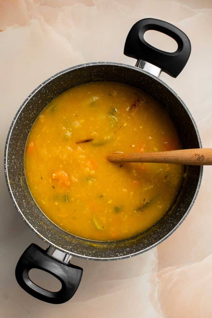 Roasted Acorn Squash Soup is smooth and velvety, packed with veggies, and loaded with fall flavor. Serve for a cozy lunch, dinner, or on Thanksgiving. | aheadofthyme.com