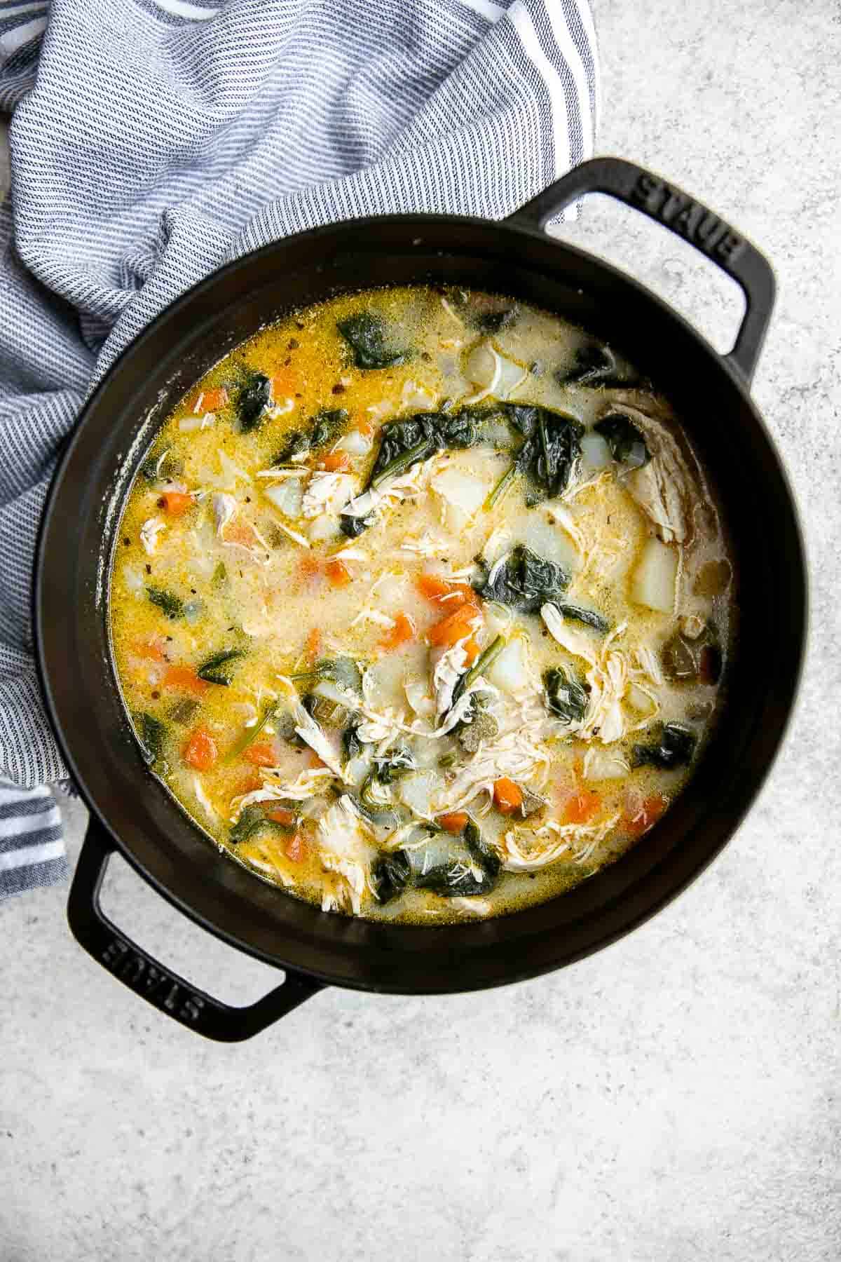 Chicken Potato Soup is cozy, hearty, and delicious — loaded with chicken, potatoes, veggies, and greens simmered in a creamy broth. Ready in 40 minutes. | aheadofthyme.com