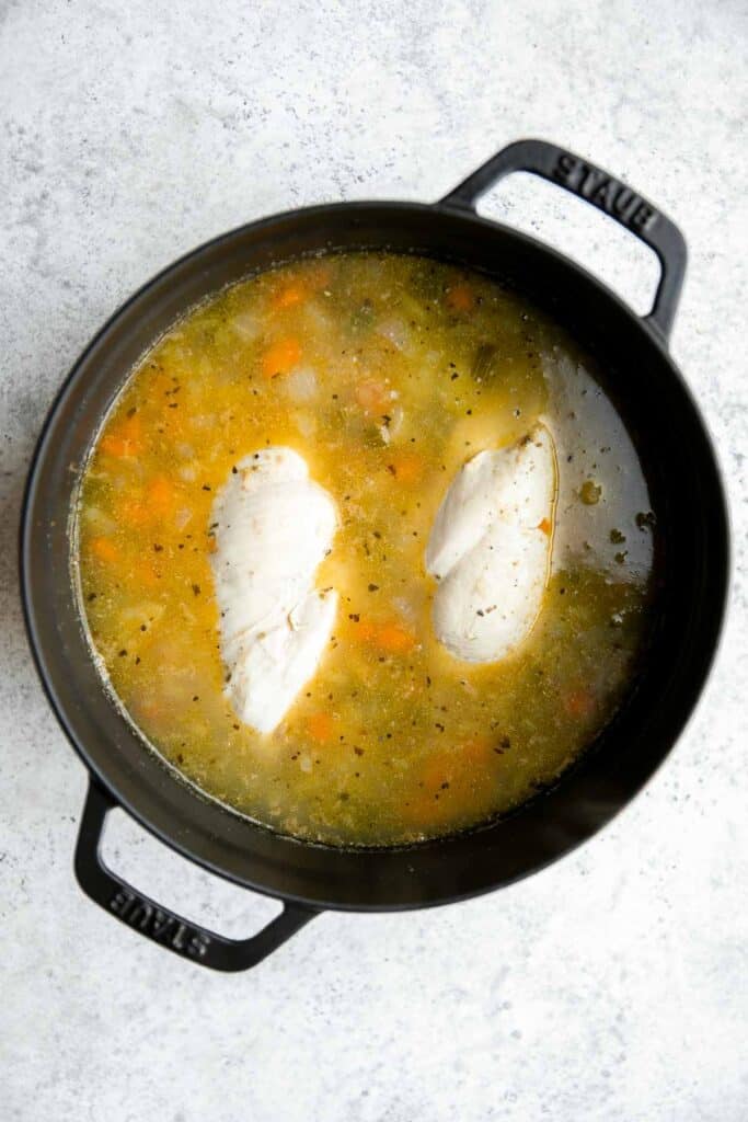 Chicken Potato Soup is cozy, hearty, and delicious — loaded with chicken, potatoes, veggies, and greens simmered in a creamy broth. Ready in 40 minutes. | aheadofthyme.com