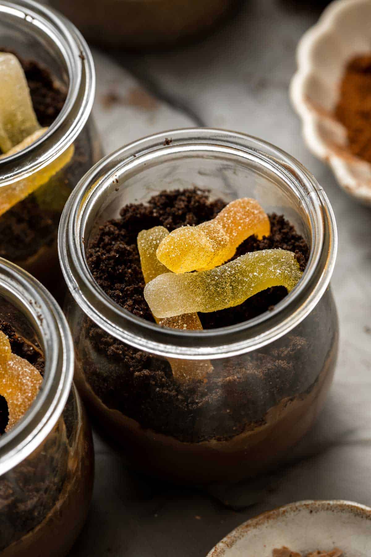 Dirt Pudding Cups are an easy Halloween dessert that is sweet, delicious, and creepy — totally on brand for spooky fun. Make worms in dirt in 10 minutes. | aheadofthyme.com