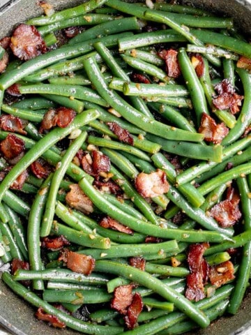 Green Beans with Bacon is a delicious, flavorful side dish that comes together quickly in 20 minutes (including prep!) with a handful of simple ingredients. | aheadofthyme.com