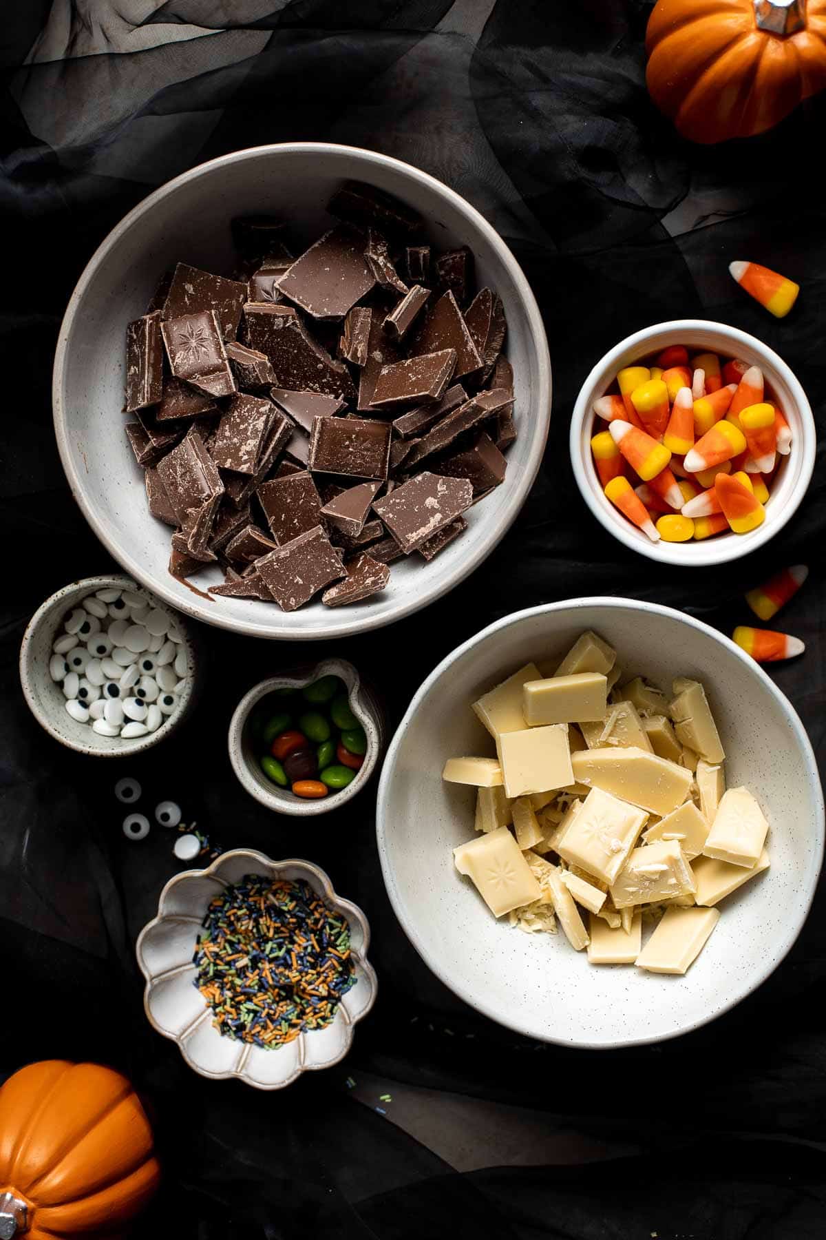 Halloween Bark is a delicious, sweet, and fun to make chocolate treat. This quick and easy no bake recipe is easy to make with a handful of ingredients. | aheadofthyme.com