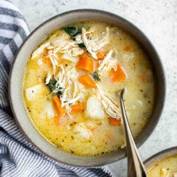 Chicken Potato Soup is cozy, hearty, and delicious — loaded with chicken, potatoes, veggies, and greens simmered in a creamy broth. Ready in 40 minutes. | aheadofthyme.com