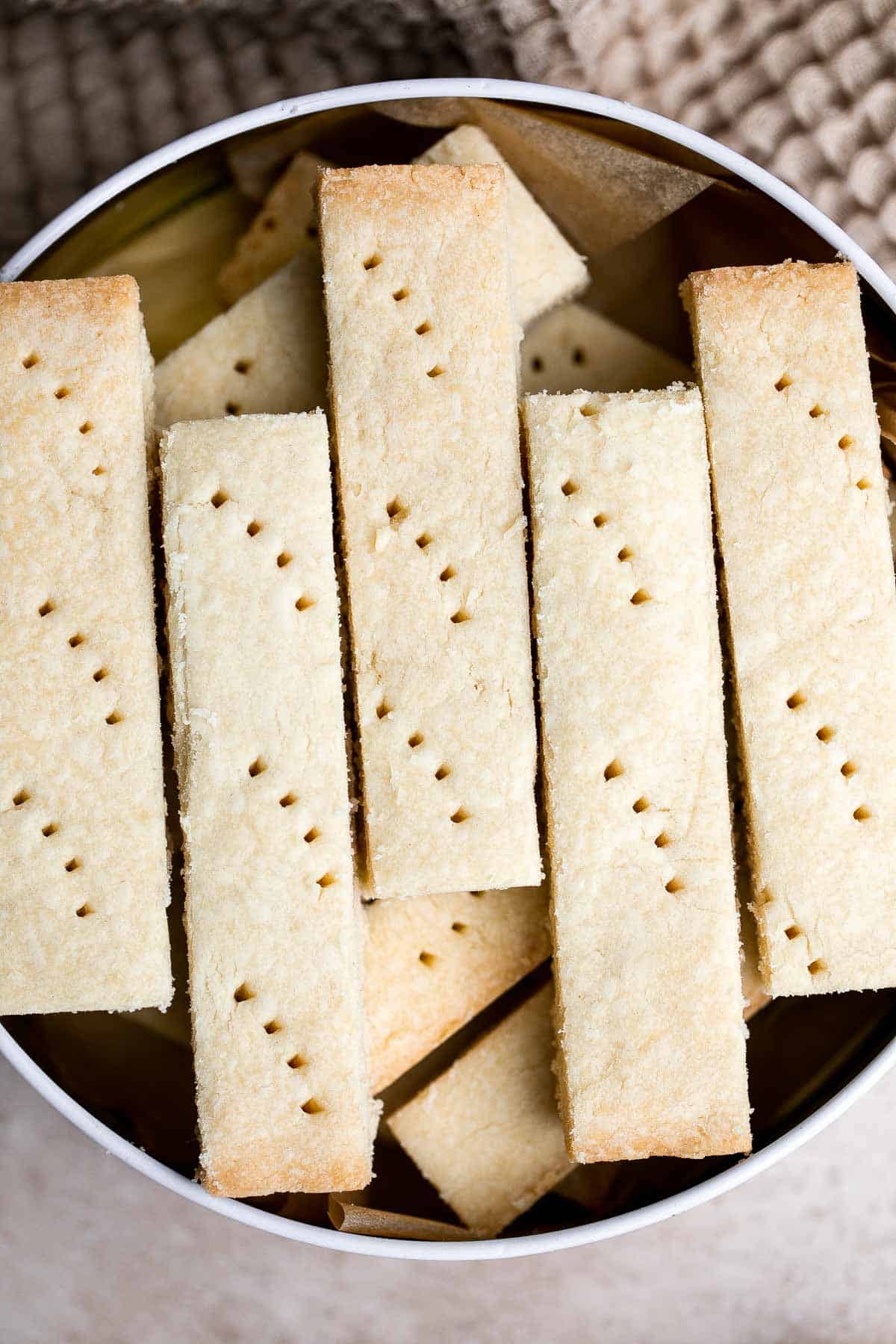 These sweet, crisp, buttery, classic Shortbread Cookies are so light that they practically dissolve in your mouth. They’re easy to make with 5 ingredients. | aheadofthyme.com