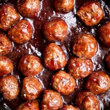 Cranberry Meatballs are sticky, sweet and tangy. These delicious bites are the perfect holiday appetizer, or a great way to use up leftover cranberry sauce. | aheadofthyme.com