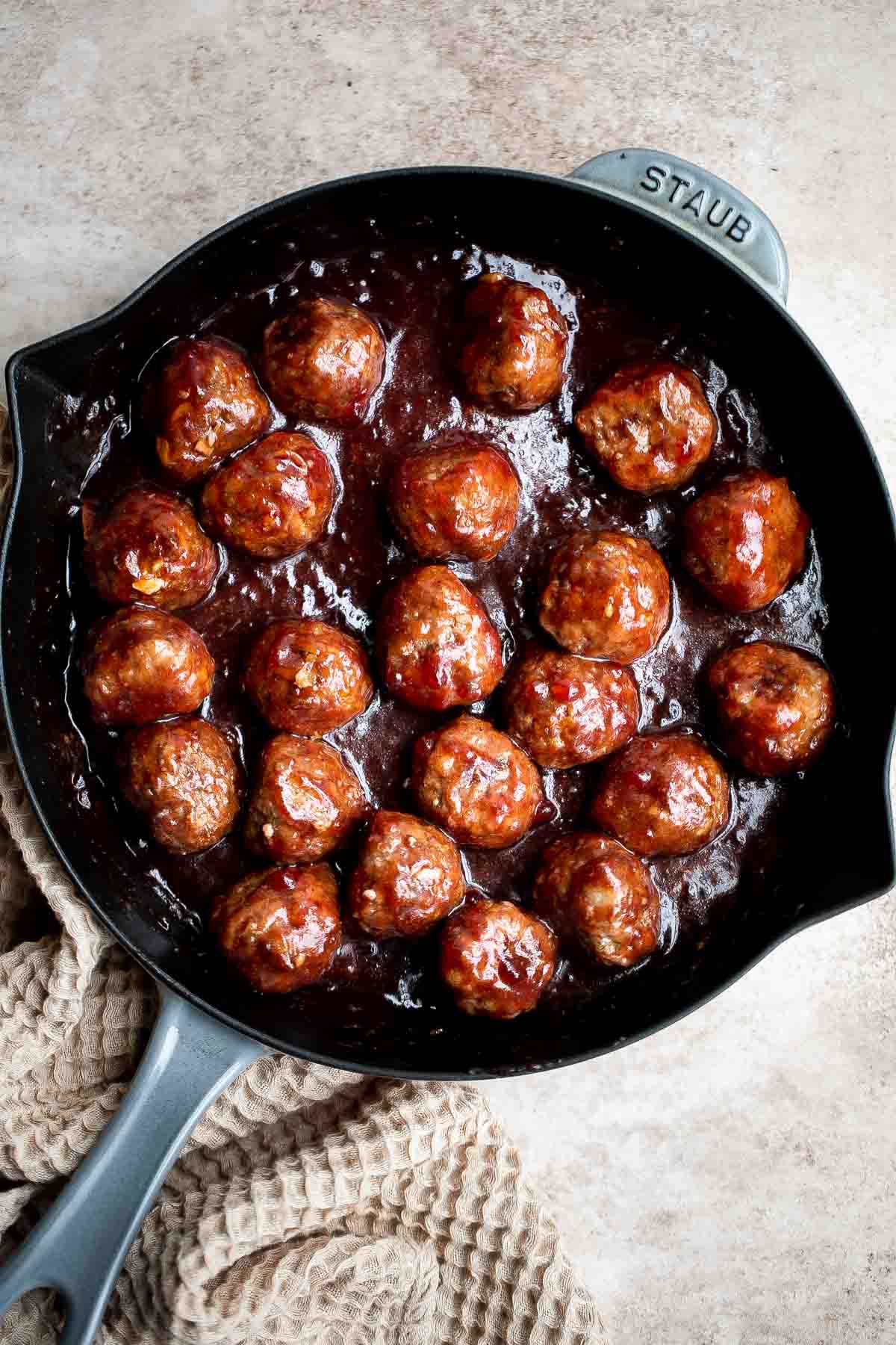 Cranberry Meatballs are sticky, sweet and tangy. These delicious bites are the perfect holiday appetizer, or a great way to use up leftover cranberry sauce. | aheadofthyme.com