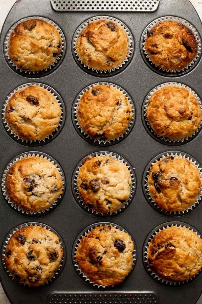 Cranberry Orange Muffins are soft, fluffy, buttery, and moist. Loaded with cranberries and orange, they are a delicious snack, breakfast, or dessert. | aheadofthyme.com
