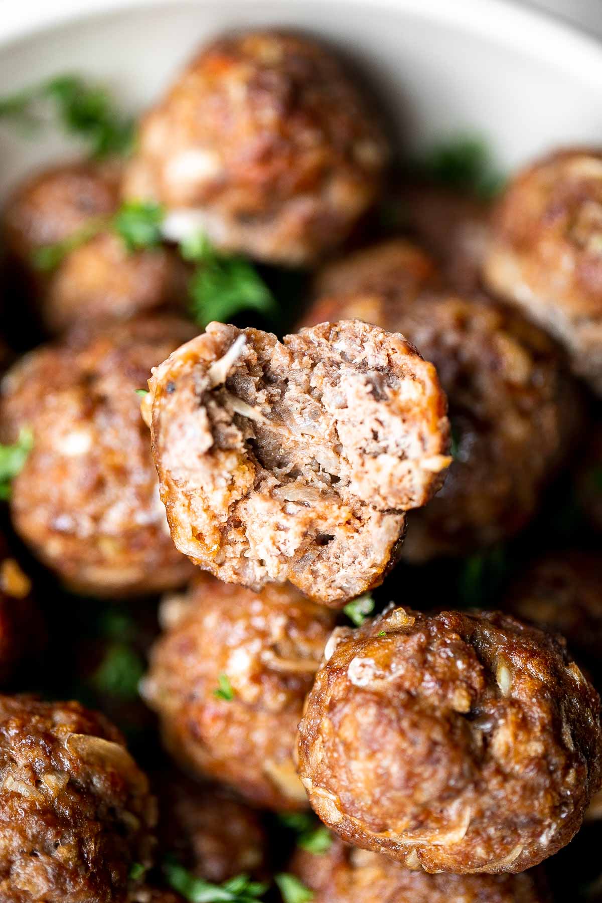 Easy Baked Meatballs are juicy, tender, loaded with flavor, and kid-friendly. Enjoy delicious homemade meatballs in under an hour using simple ingredients. | aheadofthyme.com