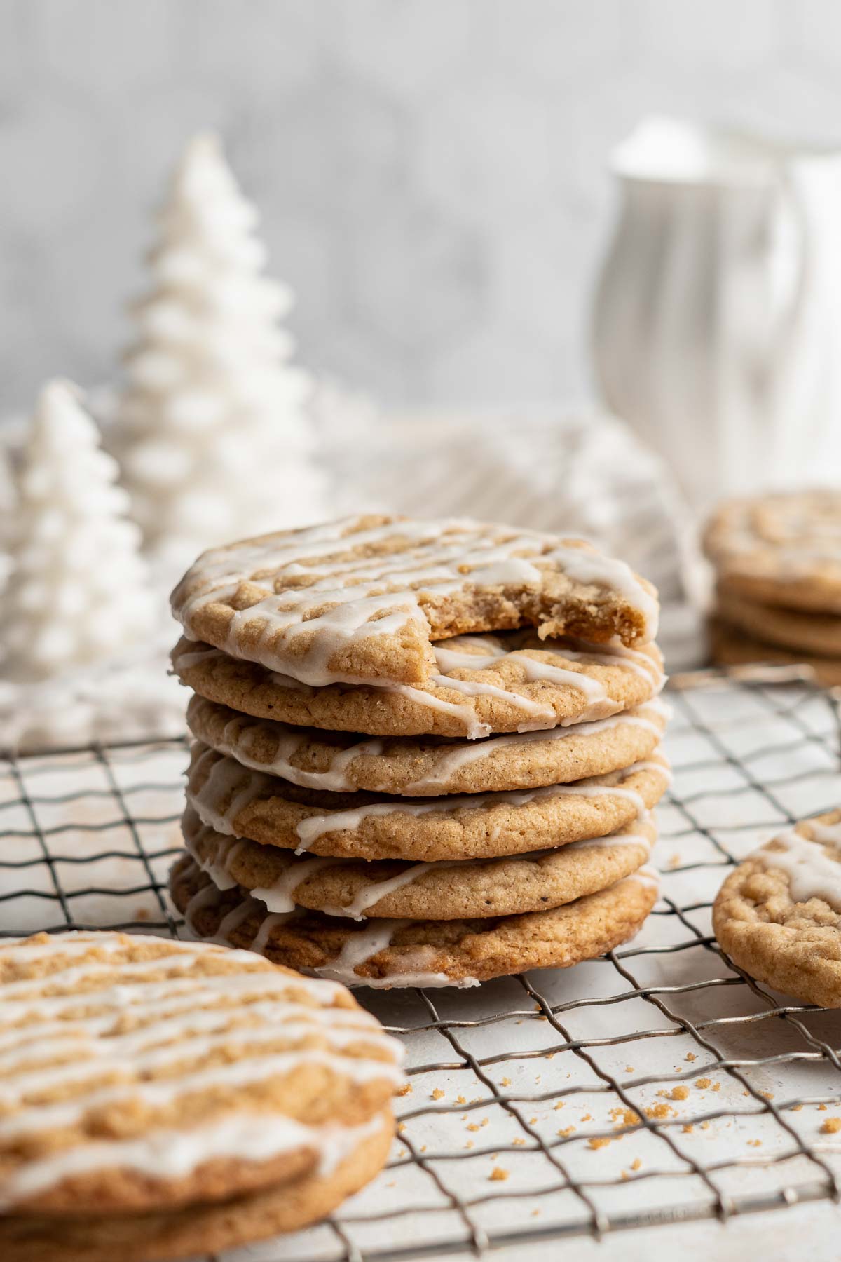Eggnog cookies are a delicious soft and chewy holiday cookie with a crackly top. They are made with eggnog, spiced warmly, and drizzled with eggnog glaze. | aheadofthyme.com