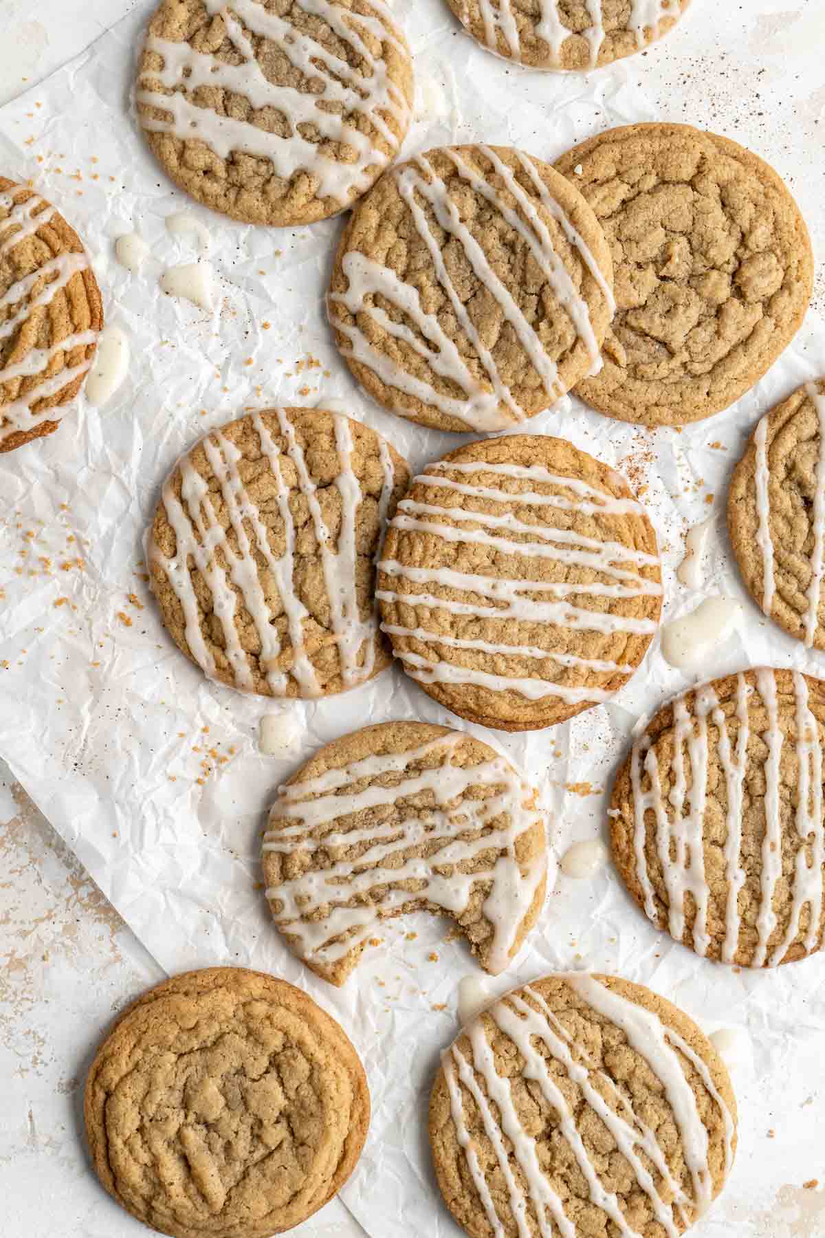 Eggnog cookies are a delicious soft and chewy holiday cookie with a crackly top. They are made with eggnog, spiced warmly, and drizzled with eggnog glaze. | aheadofthyme.com