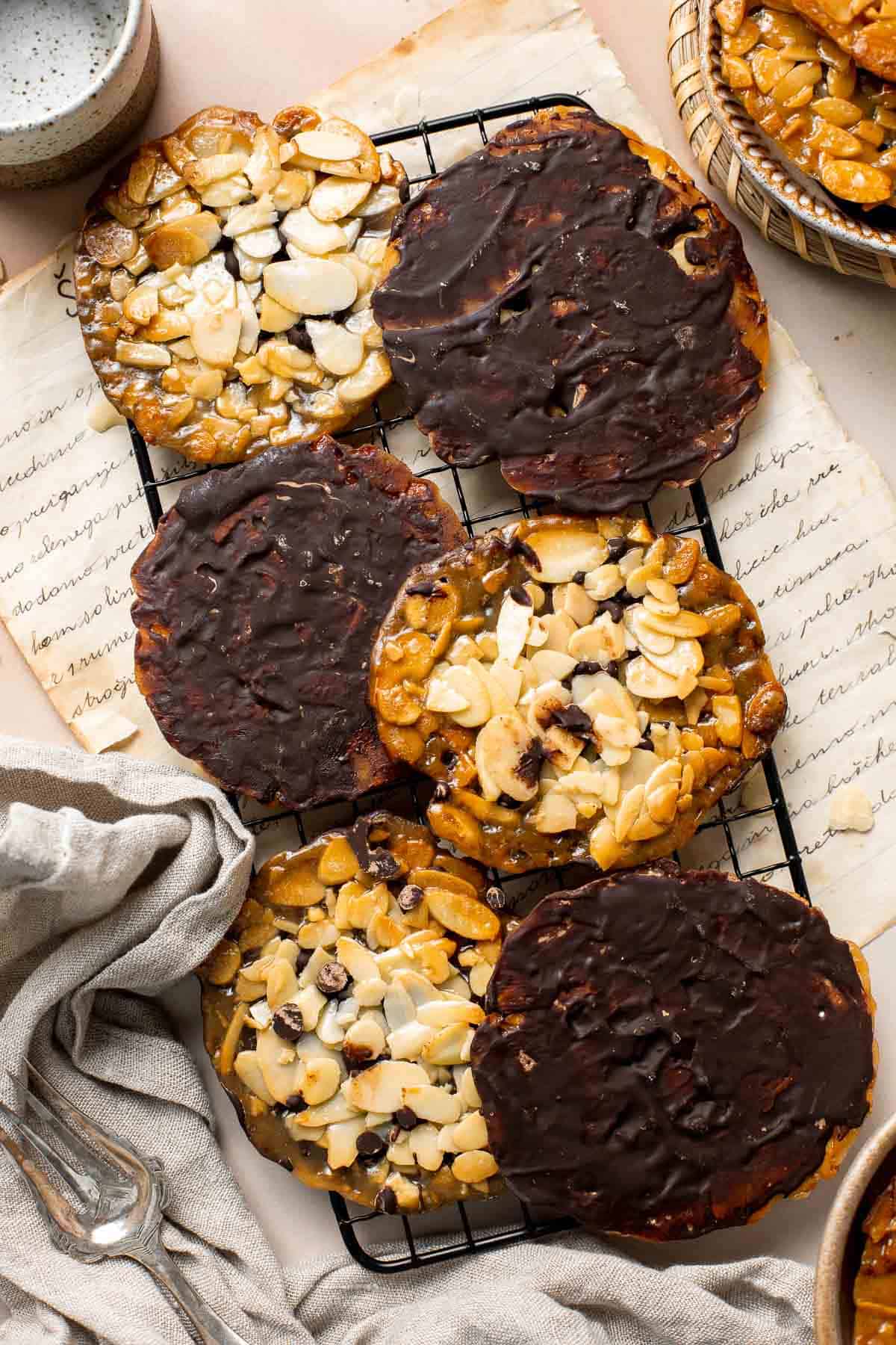 These crunchy Almond Florentines are made with sliced almonds, a sticky sweet coating that acts like hardened caramel, and a layer of dark chocolate. | aheadofthyme.com