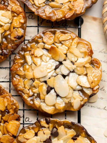 These crunchy Almond Florentines are made with sliced almonds, a sticky sweet coating that acts like hardened caramel, and a layer of dark chocolate. | aheadofthyme.com