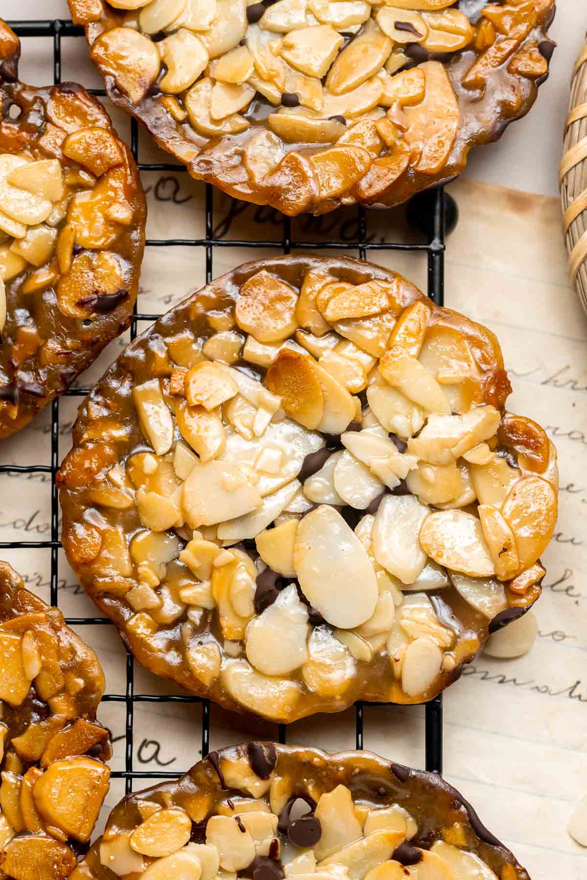 These crunchy Almond Florentines are made with sliced almonds, a sticky sweet coating that acts like hardened caramel, and a layer of dark chocolate. | aheadofthyme.com