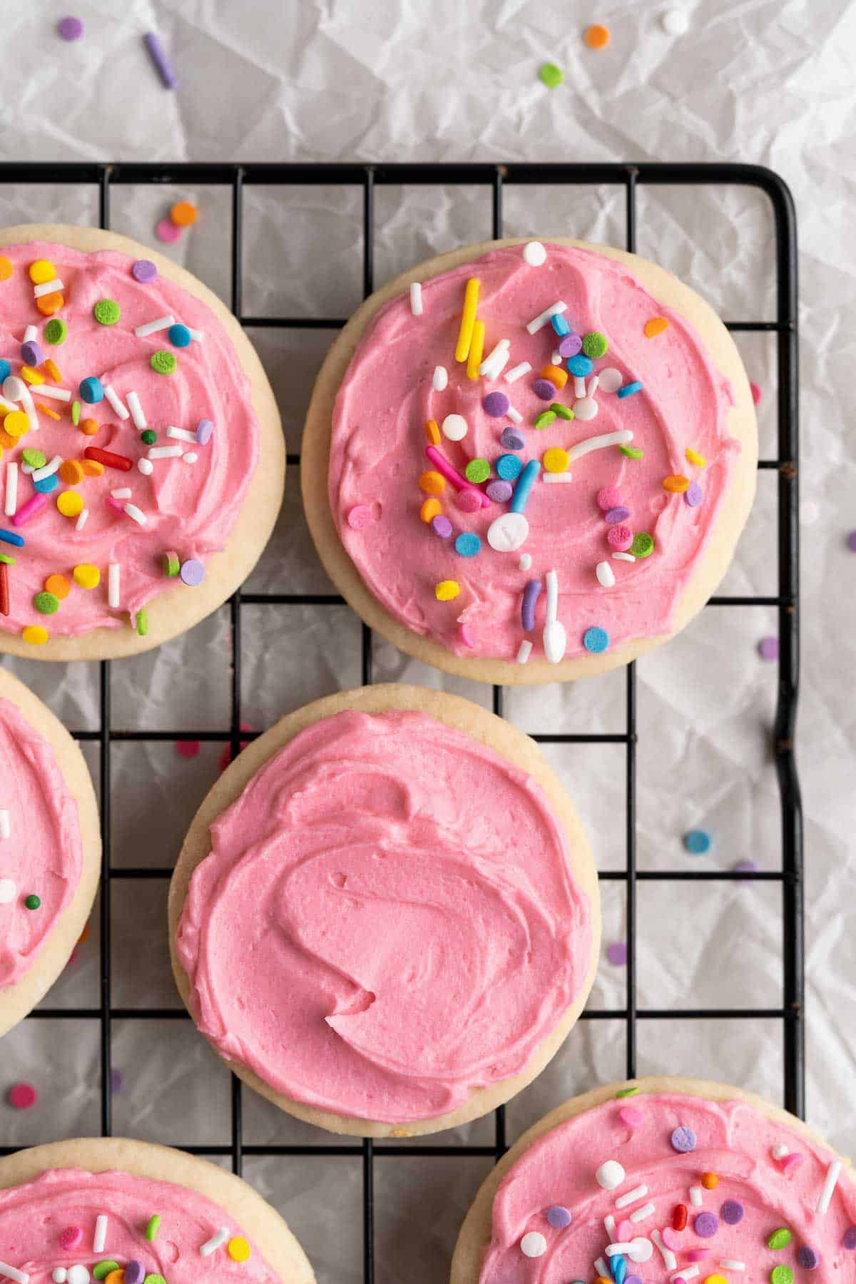 Lofthouse Cookies are super soft, moist, and thick, classic grocery store cookies made of a cakey sugar cookie, sweet buttercream frosting, and sprinkles. | aheadofthyme.com