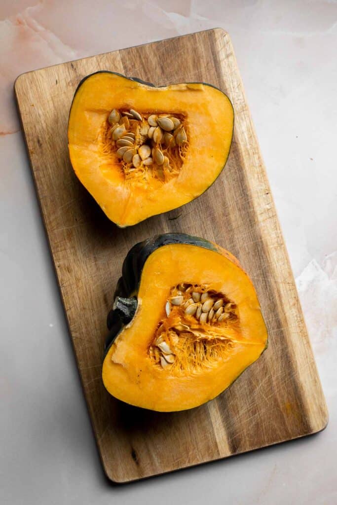 Maple Roasted Acorn Squash is savory and sweet, with its flavor intensified when tossed and roasted in a homemade maple glaze with a sprinkling of cinnamon. | aheadofthyme.com