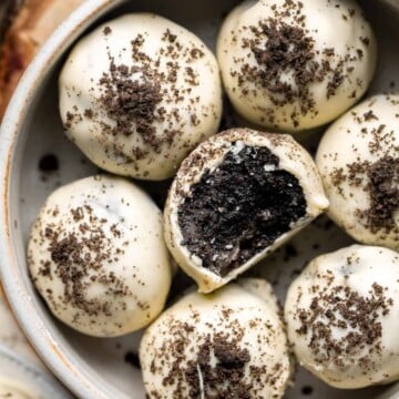 Oreo Truffles (Cookie Balls) are a quick and easy no bake dessert that is rich, sweet, fudgy, and delicious — and made with just 3 simple ingredients. | aheadofthyme.com