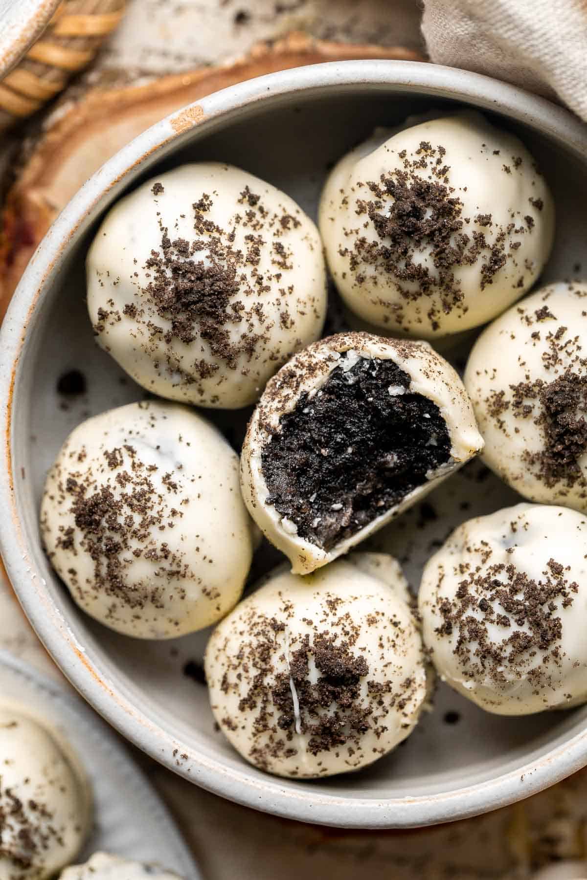 Oreo Truffles (Cookie Balls) are a quick and easy no bake dessert that is rich, sweet, fudgy, and delicious — and made with just 3 simple ingredients. | aheadofthyme.com
