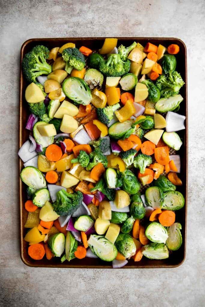 Oven Roasted Vegetables are a delicious flavorful side dish that goes well with almost any dinner main. Customize it with whatever veggies you have on hand. | aheadofthyme.com