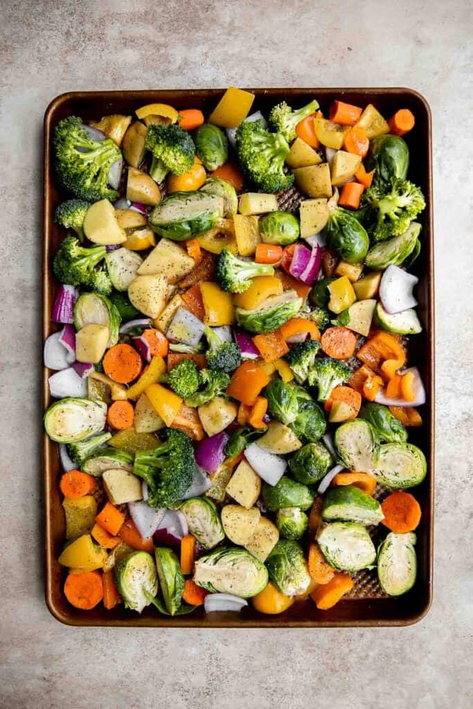 Oven Roasted Vegetables are a delicious flavorful side dish that goes well with almost any dinner main. Customize it with whatever veggies you have on hand. | aheadofthyme.com