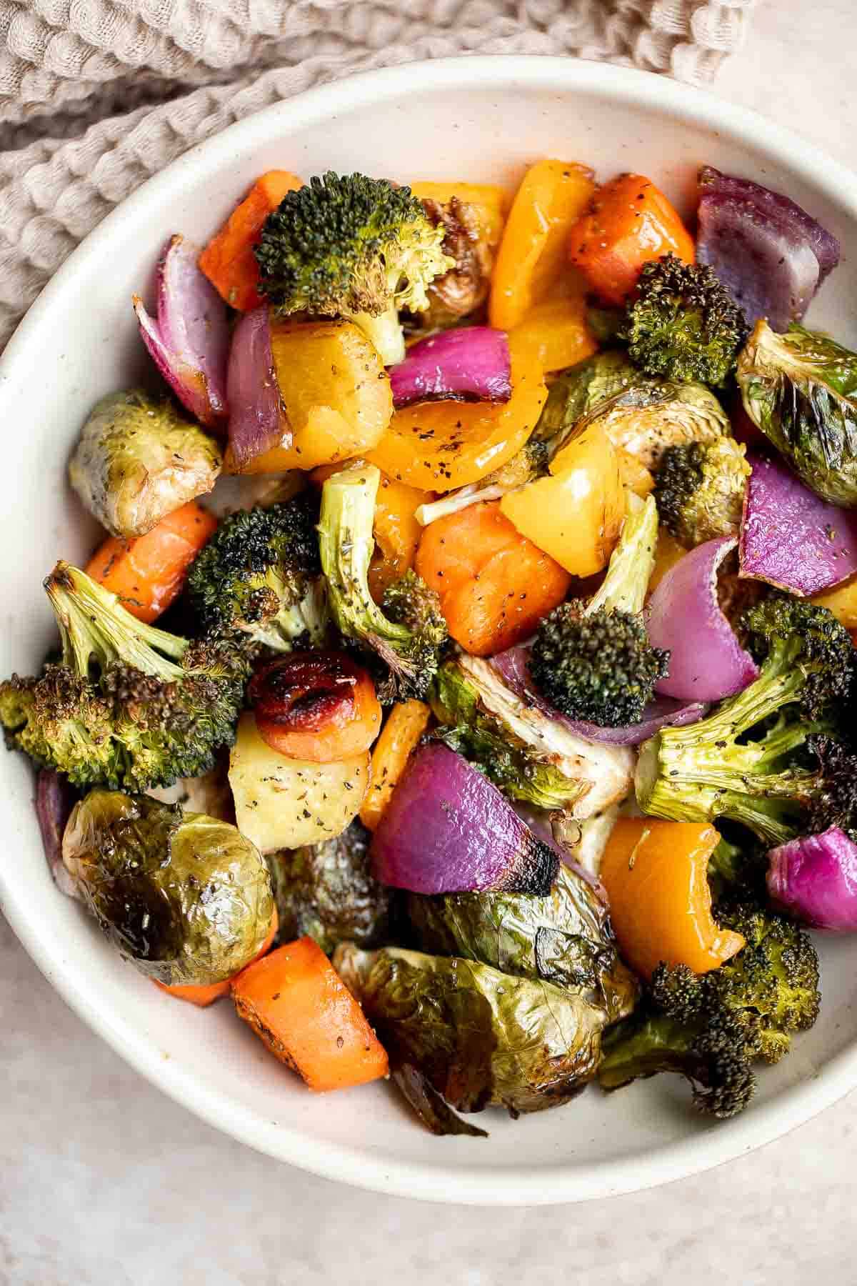 Oven Roasted Vegetables are a delicious flavorful side dish that goes well with almost any dinner main. Customize it with whatever veggies you have on hand. | aheadofthyme.com