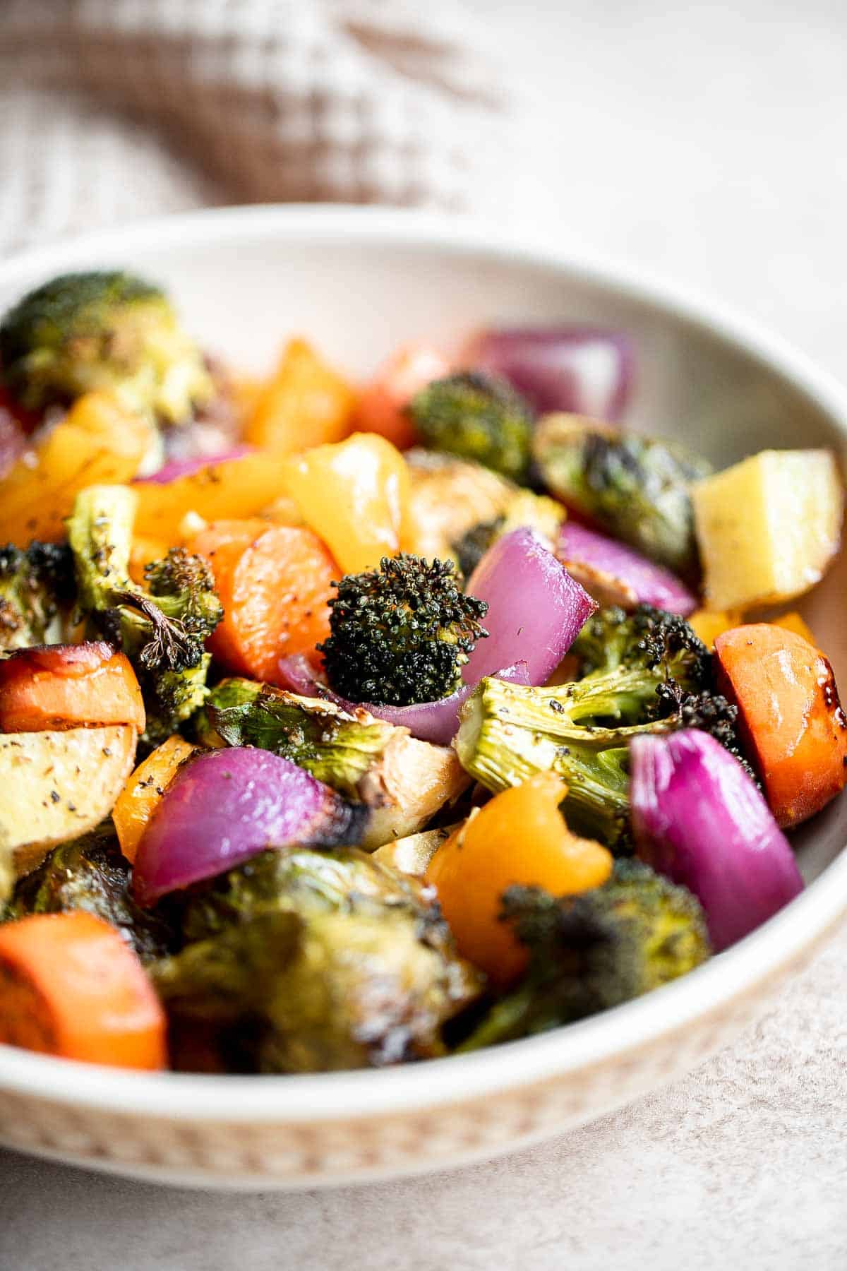 Oven Roasted Vegetables are a delicious flavorful side dish that goes well with almost any dinner main. Customize it with whatever veggies you have on hand. | aheadofthyme.com