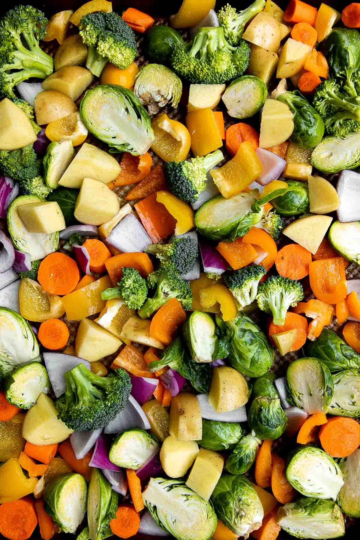 Oven Roasted Vegetables are a delicious flavorful side dish that goes well with almost any dinner main. Customize it with whatever veggies you have on hand. | aheadofthyme.com