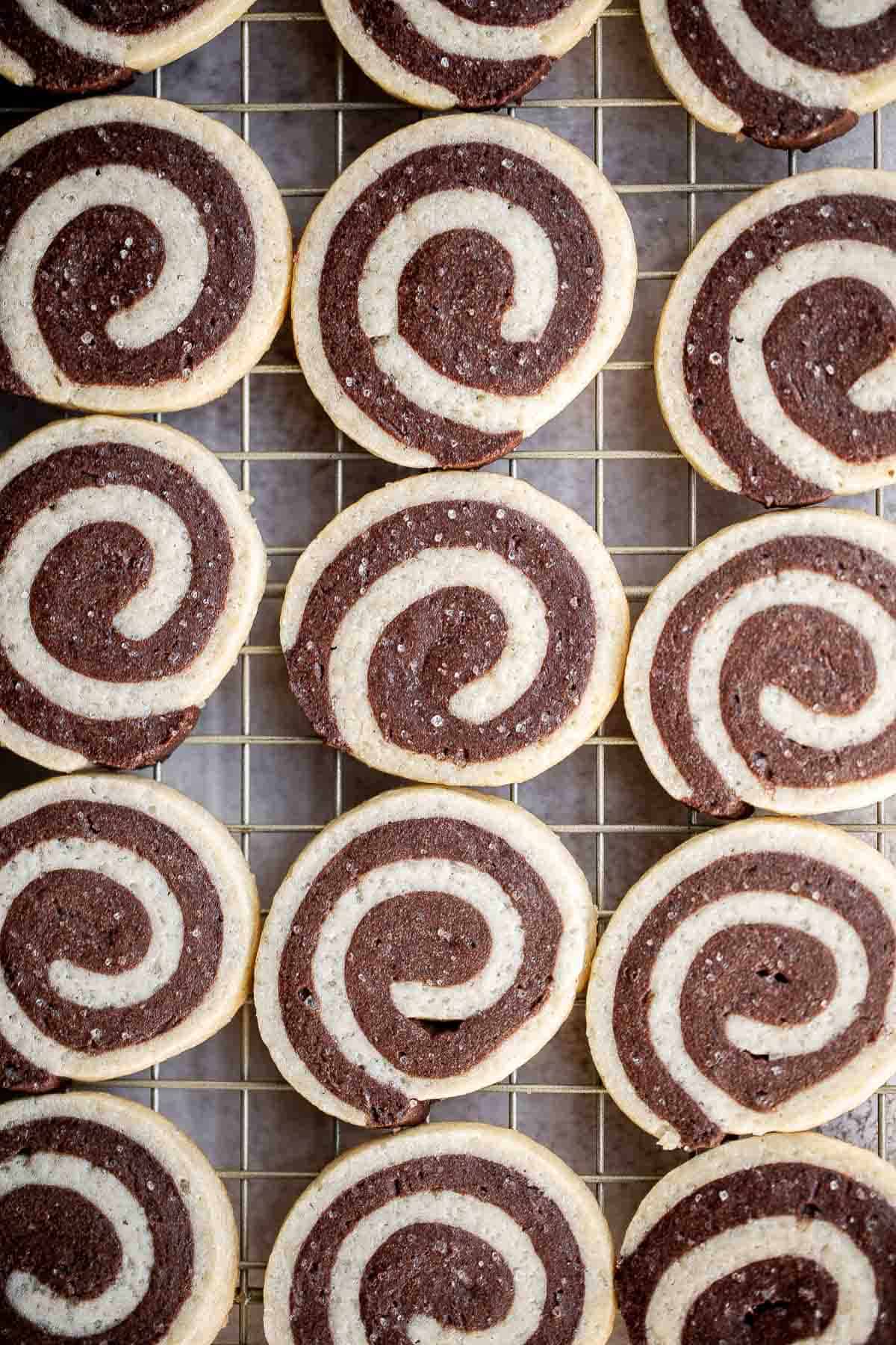 Chocolate Pinwheel Cookies are a Christmastime classic — sweet, buttery, and melt in your mouth delicious. Plus, an easy to make slice-and-bake cookie. | aheadofthyme.com