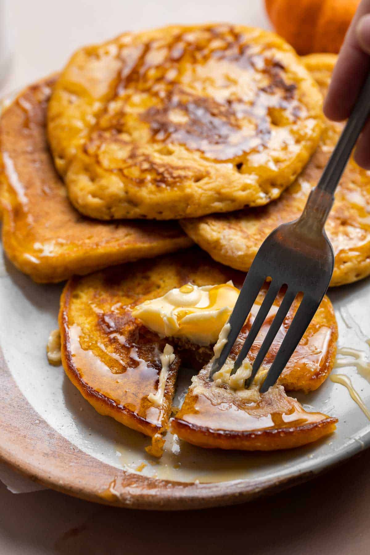 Homemade Pumpkin Pancakes are the perfect fall breakfast — light, fluffy, delicious, and warmly spiced. Ready in just 15 minutes with simple pantry staples. | aheadofthyme.com