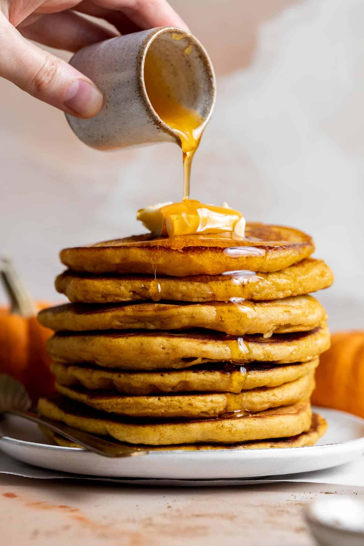 Homemade Pumpkin Pancakes are the perfect fall breakfast — light, fluffy, delicious, and warmly spiced. Ready in just 15 minutes with simple pantry staples. | aheadofthyme.com