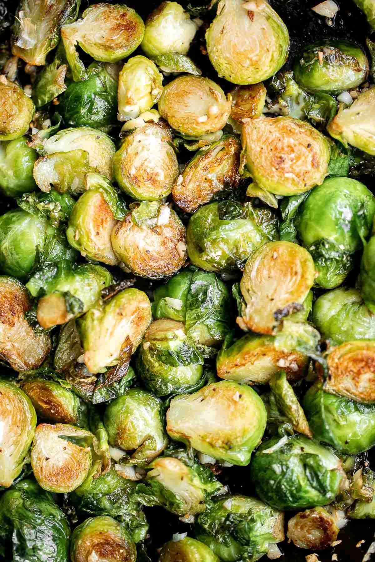 Sautéed Brussels Sprouts are a quick and easy side dish made with just 5 ingredients and ready to serve in only 15 minutes. They're vegan and keto too. | aheadofthyme.com