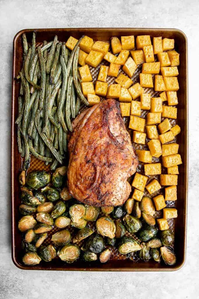 This Sheet Pan Thanksgiving Dinner is the easiest way to serve a small turkey dinner with sides. Ready in just an hour and half, this will change your life! | aheadofthyme.com