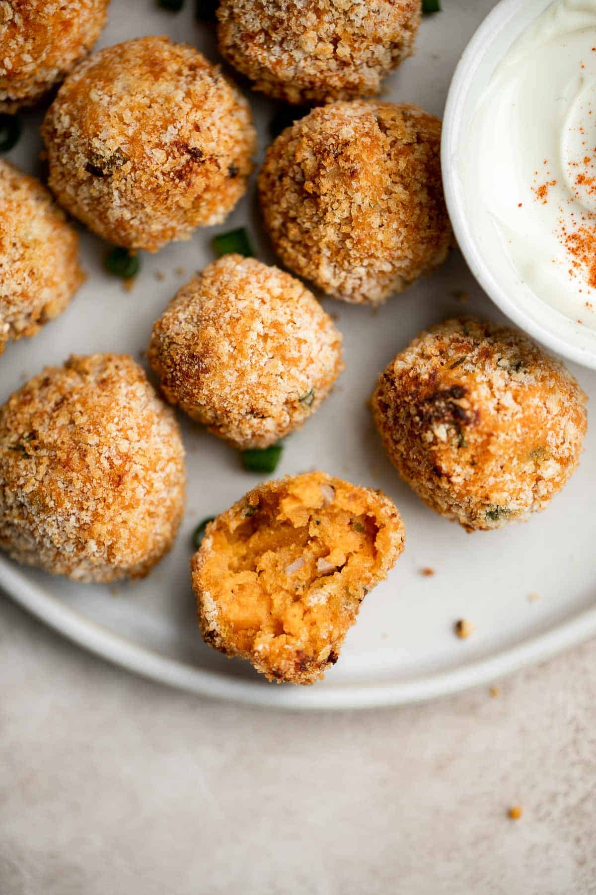 Sweet Potato Croquettes are delicious, flavorful, savory balls of mashed sweet potatoes, cheese, and seasoning — crisp outside and soft and tender inside. | aheadofthyme.com