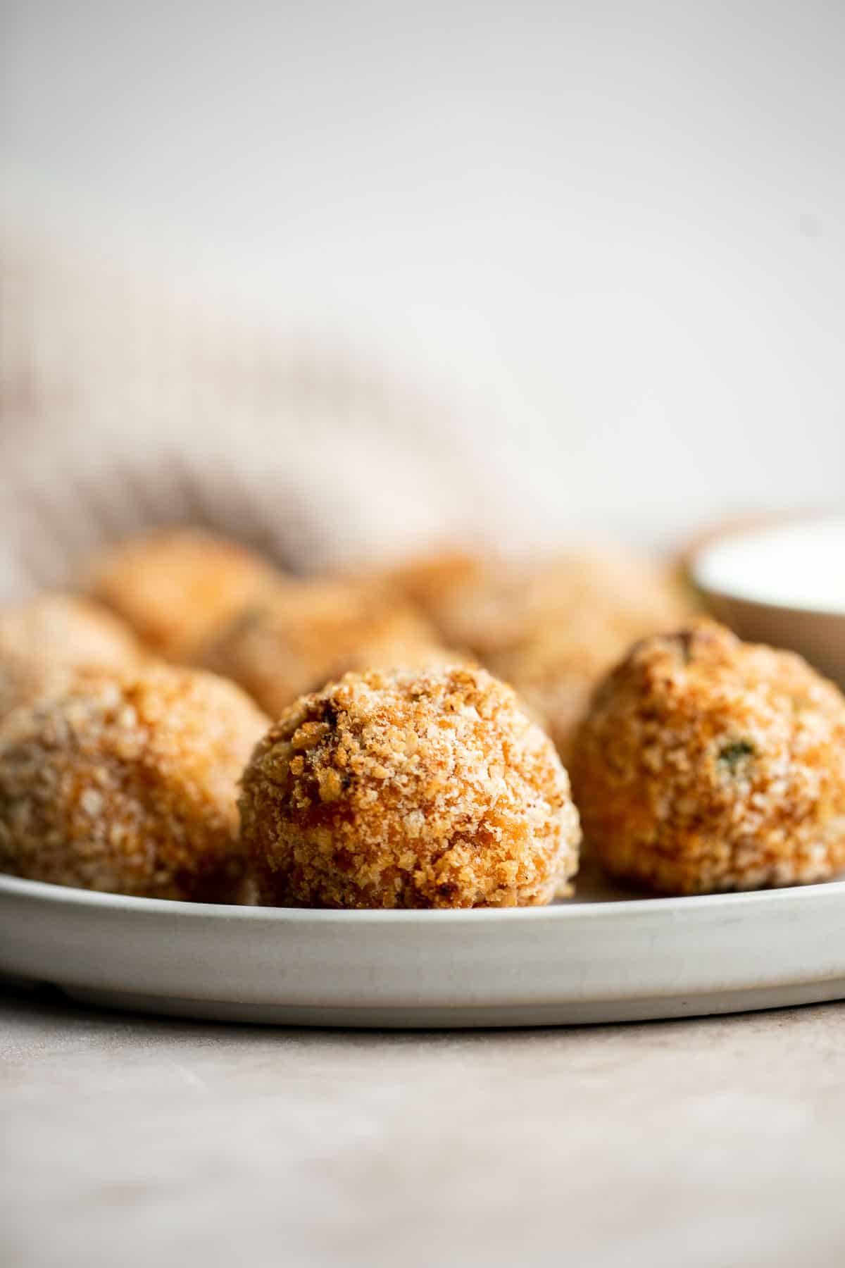 Sweet Potato Croquettes are delicious, flavorful, savory balls of mashed sweet potatoes, cheese, and seasoning — crisp outside and soft and tender inside. | aheadofthyme.com