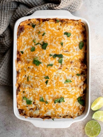 Turkey Enchiladas are a cheesy, filling, and comforting meal that is quick and easy to make using a handful of ingredients including leftover turkey. | aheadofthyme.com