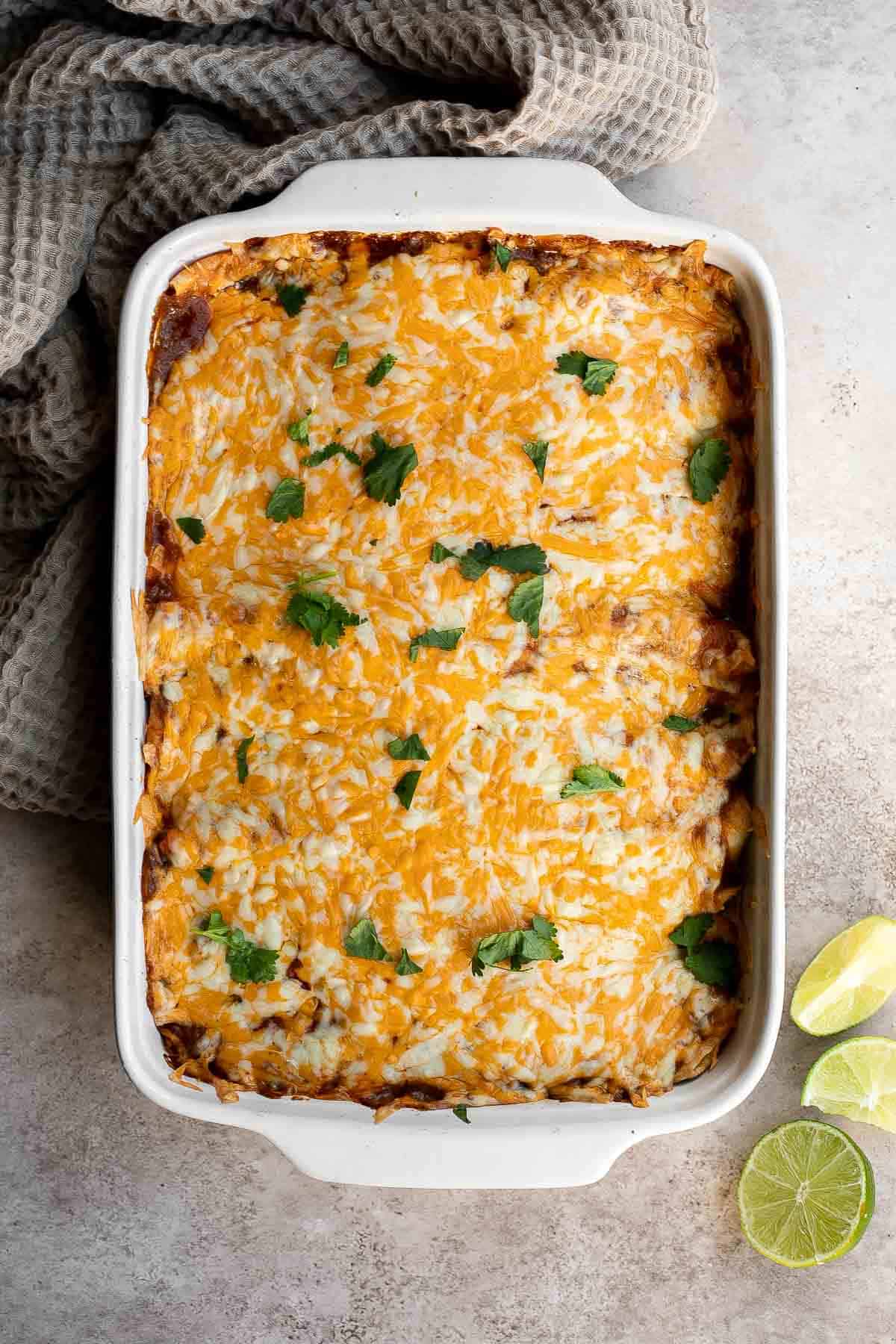 Turkey Enchiladas are a cheesy, filling, and comforting meal that is quick and easy to make using a handful of ingredients including leftover turkey. | aheadofthyme.com