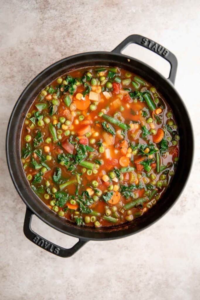 Vegetable Soup is a hearty, vegan soup that is delicious, flavorful, and easy to make. It’s loaded with all kinds of veggies in a savory broth. | aheadofthyme.com