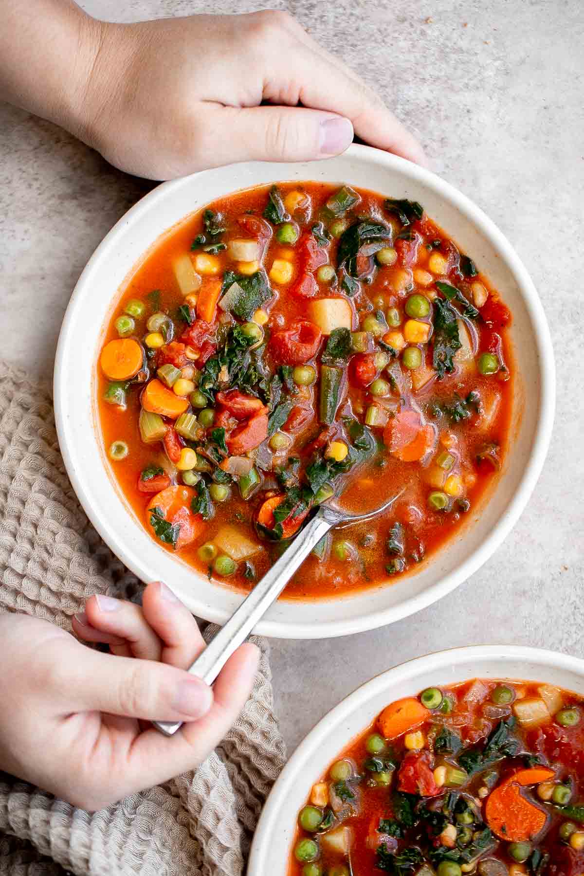 Vegetable Soup is a hearty, vegan soup that is delicious, flavorful, and easy to make. It’s loaded with all kinds of veggies in a savory broth. | aheadofthyme.com
