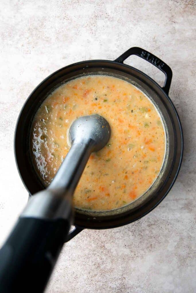 White Bean Soup with Kale is a hearty and nourishing one-pot meal that is flavorful and easy. Make this healthy soup in 30 minutes using simple ingredients. | aheadofthyme.com