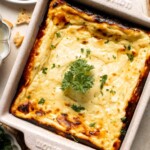 Baked ricotta is creamy, smooth, and flavorful. This delicious warm dip is packed with Parmesan and seasoned with dried herbs for the ultimate cheesy dip. | aheadofthyme.com