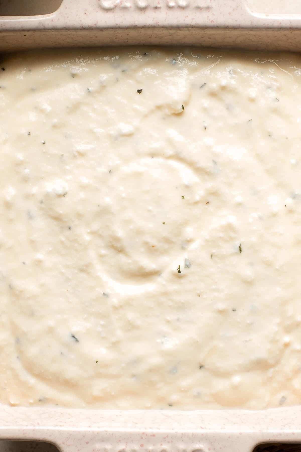 Baked ricotta is creamy, smooth, and flavorful. This delicious warm dip is packed with Parmesan and seasoned with dried herbs for the ultimate cheesy dip. | aheadofthyme.com