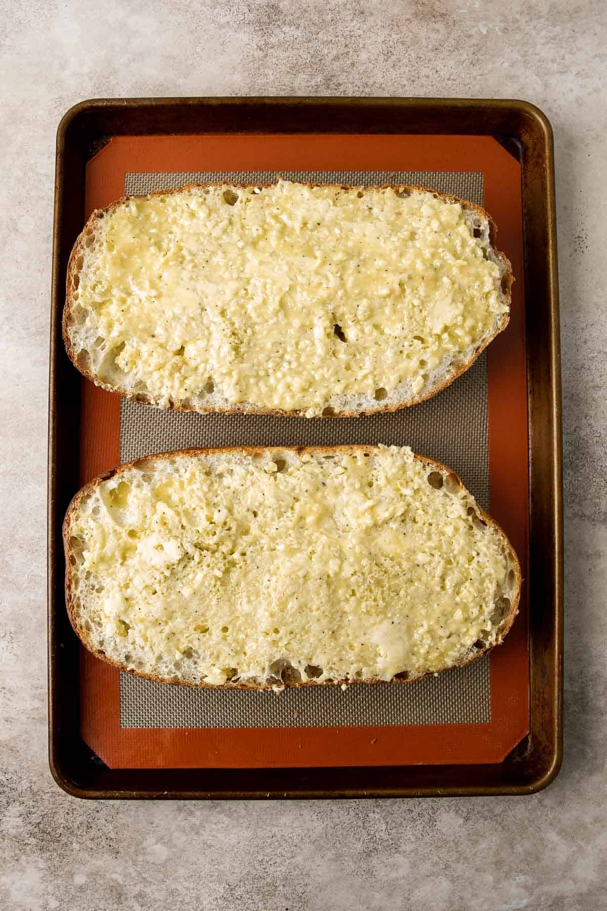 Cheesy Garlic Bread is toasty and crispy on the outside, tender and soft inside with a garlic butter and melty cheese on top. Make in under 20 minutes! | aheadofthyme.com